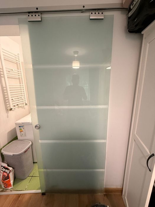 Usa de interior culisanta din sticla securizata