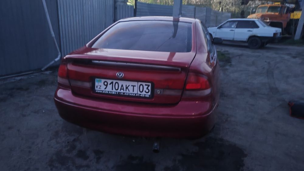Мазда Кронос 626