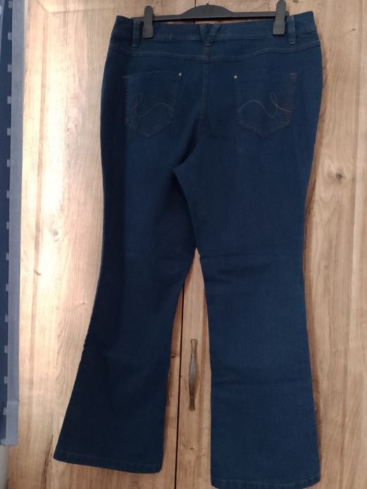 Blugi denim evazați ușor elastici