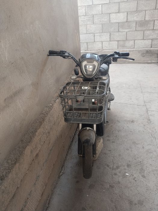 Электроскутер велосипеды