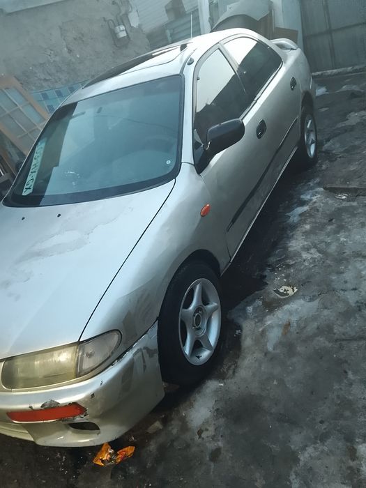 Продам машину Мазда s323