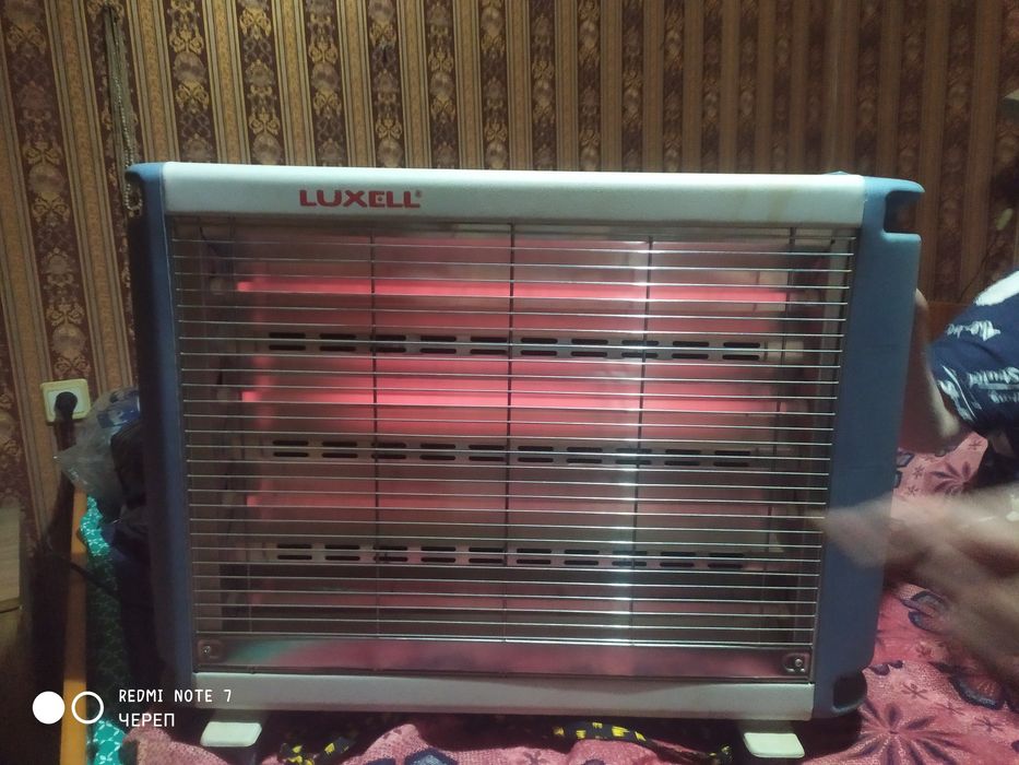 Масляный обогреватель