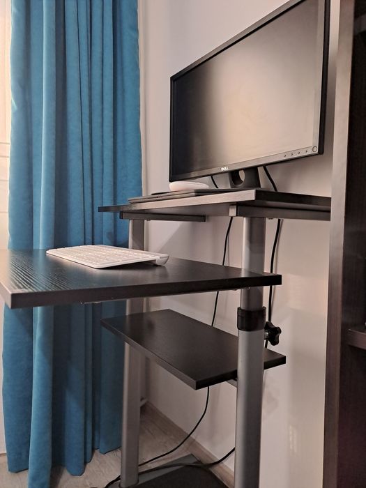 Birou reglabil pe înalțime