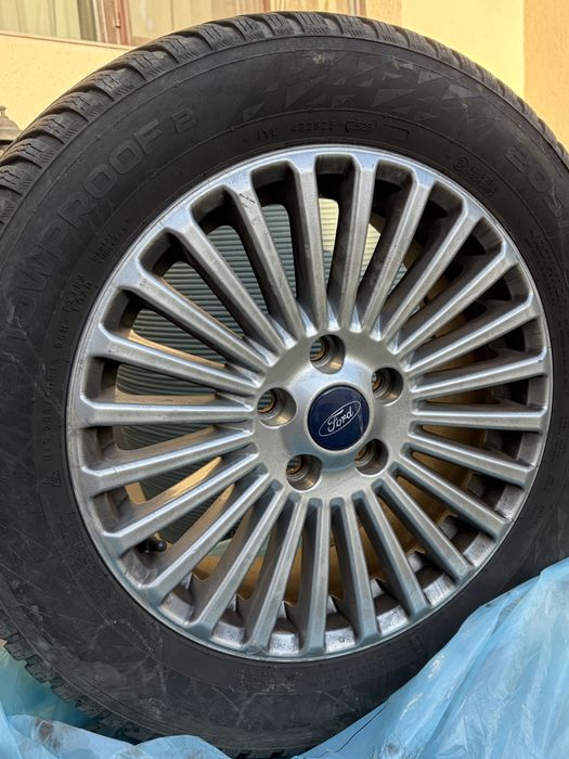 Vand roti complete Ford 16 cu anvelope de iarna aproape noi