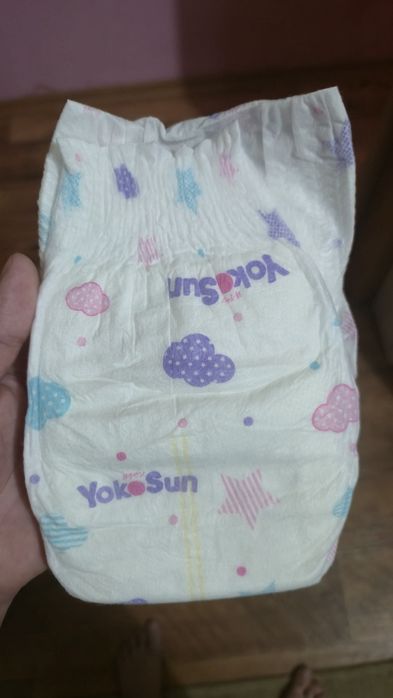 Продам  памперсы Yokosun
