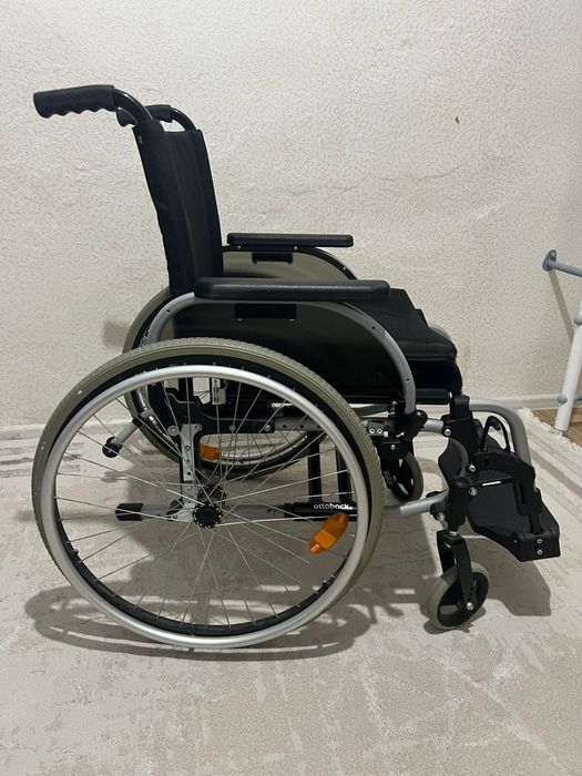 Инвалидная коляска