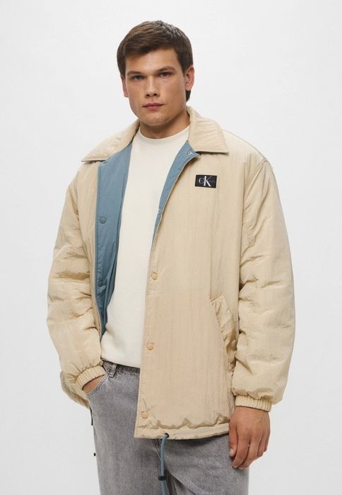 Чисто ново зимно яке Calvin Klein с две лица