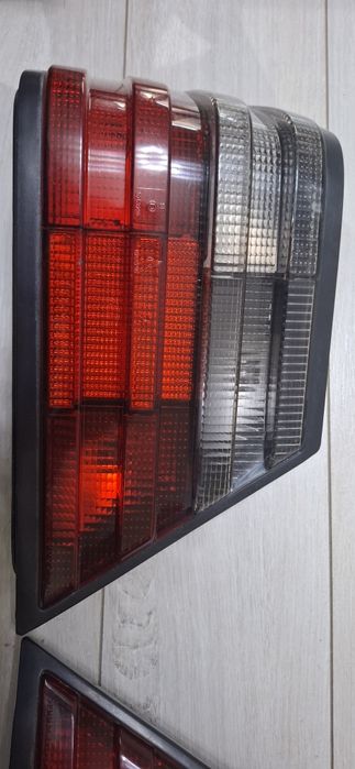 W124 задние стопы HELLA