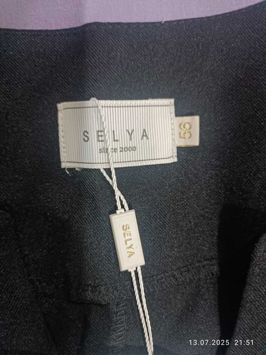 Продаётся новый женский костюм