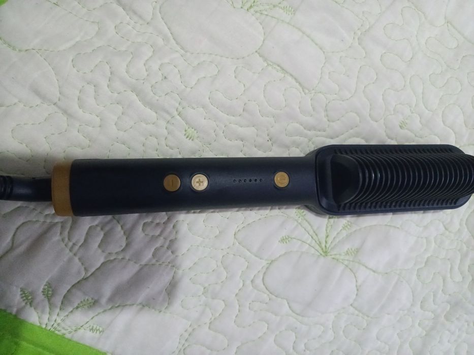 Perie de îndreptat părul