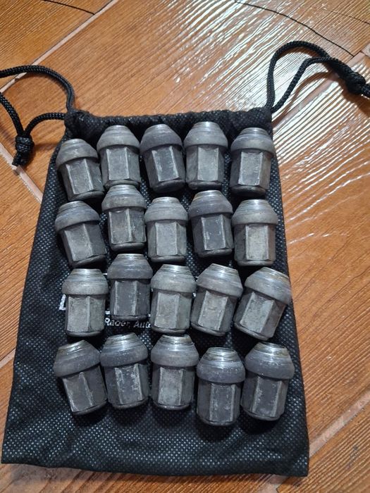 Set 20 piulțe originale ptr.Ford jante aliaj