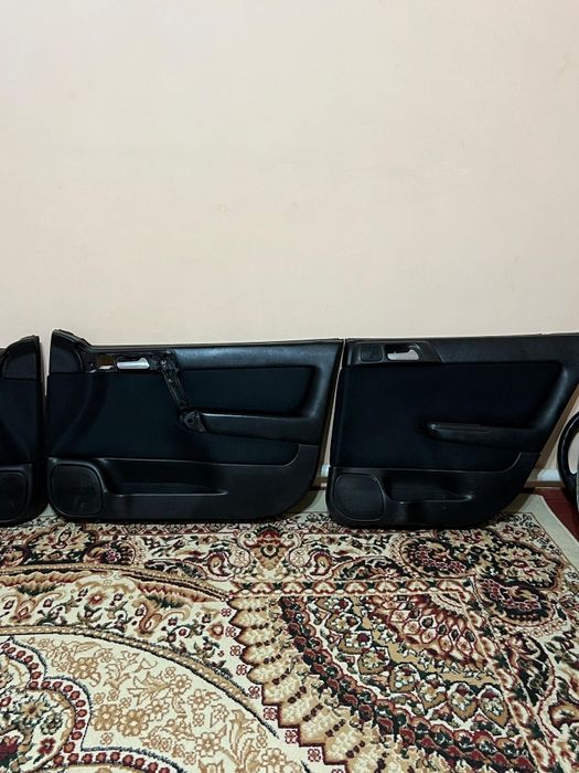 Дверные обшивки на Опель Астра Джи