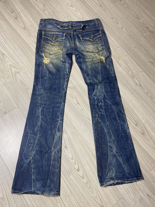 Gostar De Fuga flared distressed painted denim