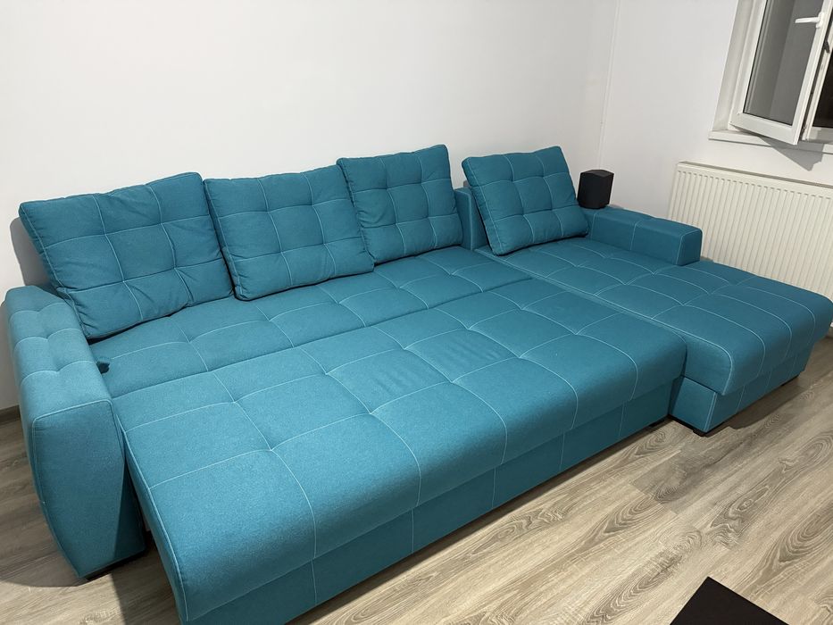 Canapea turcoaz impecabila