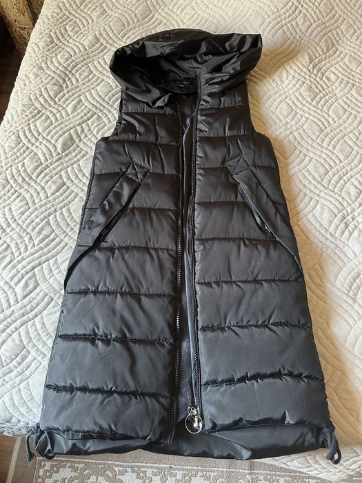 Женская жилетка.