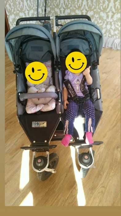 Двухместная коляска