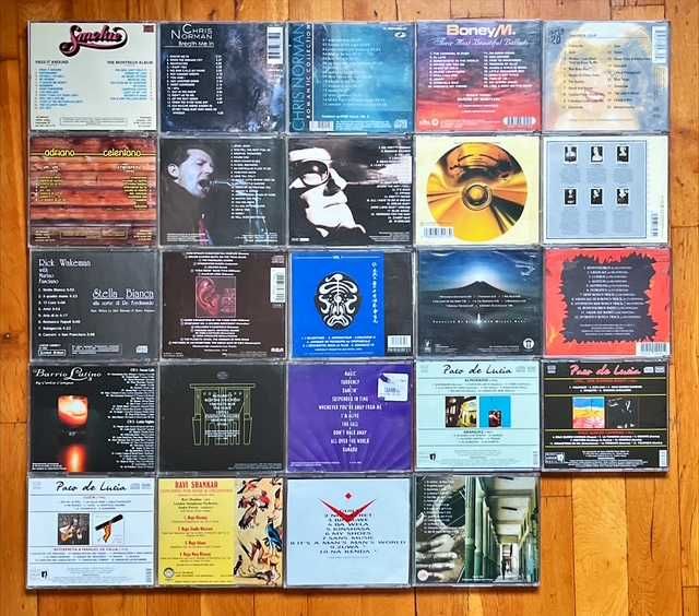 Lot CD rusesti rock&pop: Pink Floyd, Zappa, Jethro Tull, Maiden, Smokie, Wakeman, De Lucia