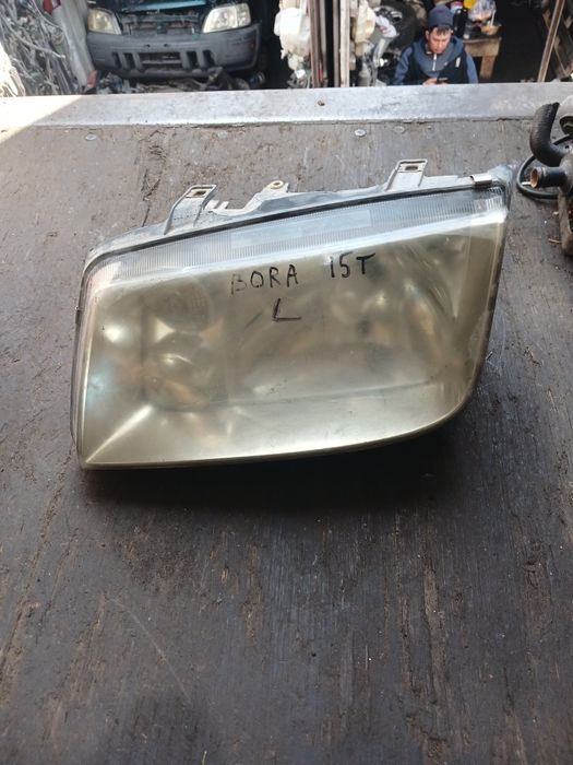 Фара Фольксваген Бора левая