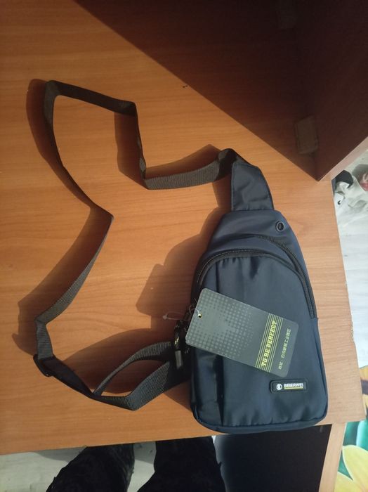 Продам книгу и барсетку