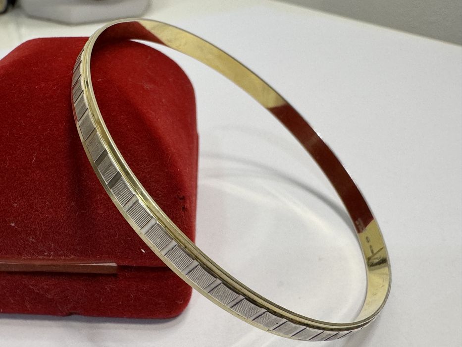 Bratara veche, argint 800, placata cu aur. Fixa.