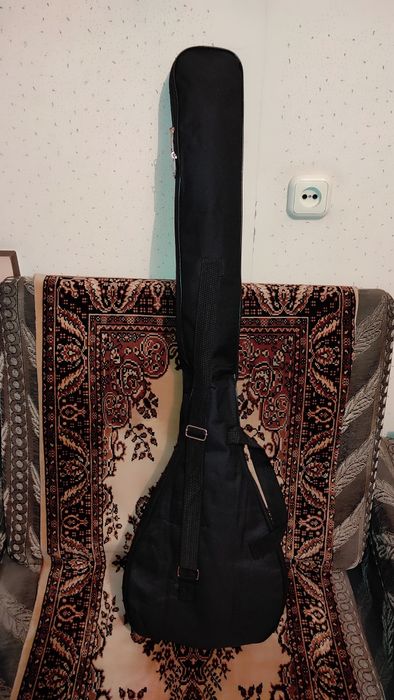 Домбра чехолымен