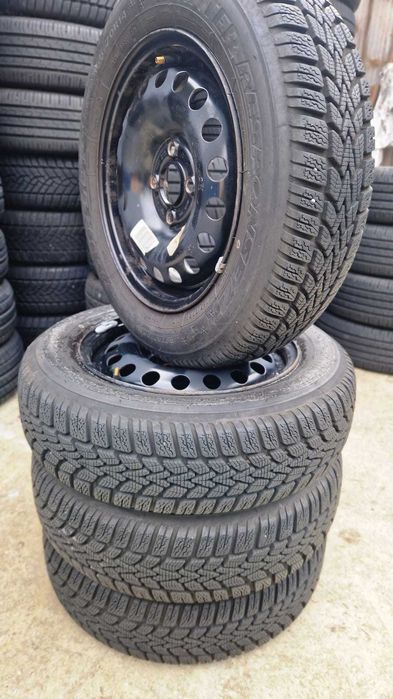 set roti 4x100 anvelope iarna 165 70 R 14 Dunlop