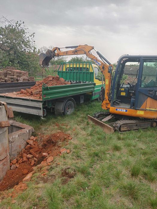 услуги със самосвал ,мини багер ,челен товарач и комбиниран багер