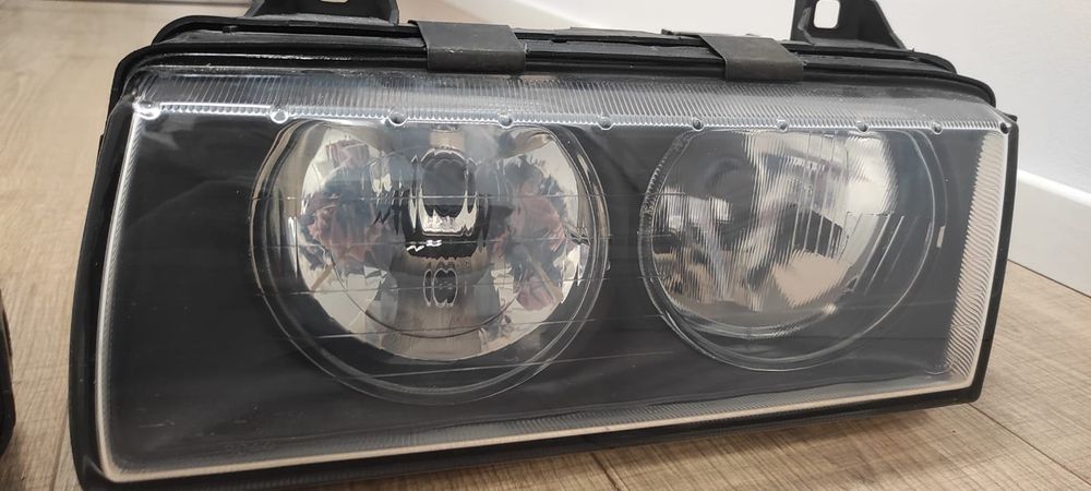 Faruri BMW e36 NOI Hella cu sticle zkw