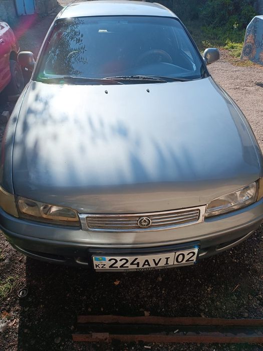 Мазда кроус 626 свет серыи