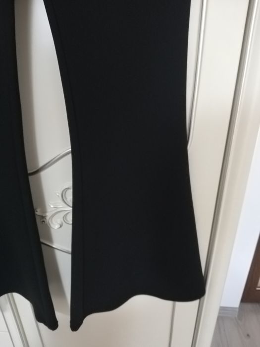 Pantaloni evazati femei