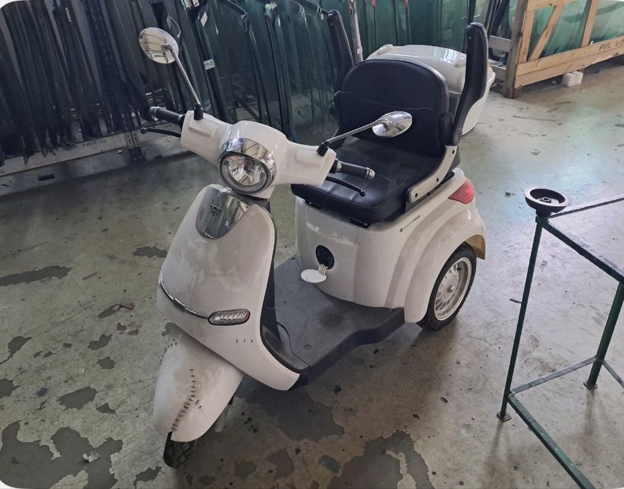 Scuter electric pentru persoane cu mobilitate redusa