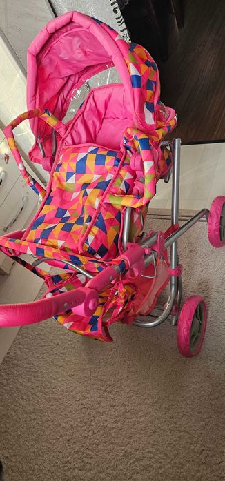 Игрушечная детская коляска