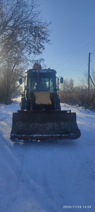 Услуги экскаватор-погрузчик