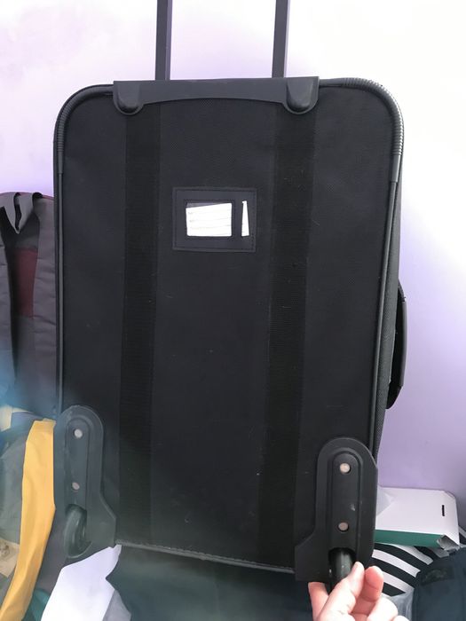 Ruxac laptop si troler voiaj