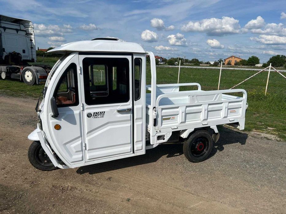 Triciclu electric cargo cu cabina si bena basculabila 2025 - autonomie 80 km. Pret 11800 lei (negociabil)