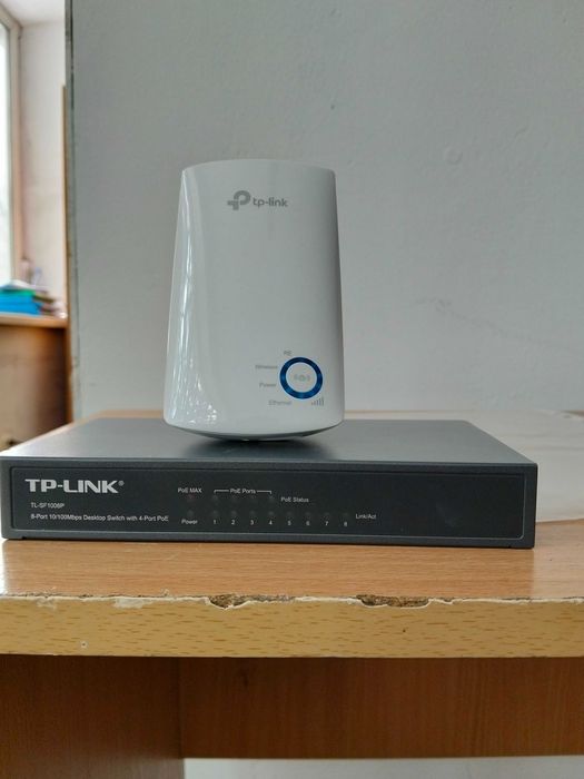 Продам TP-Link TL-SF1008P + TL-WA850RE