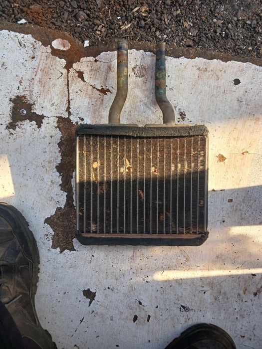 Радиатор печки Мазда 121