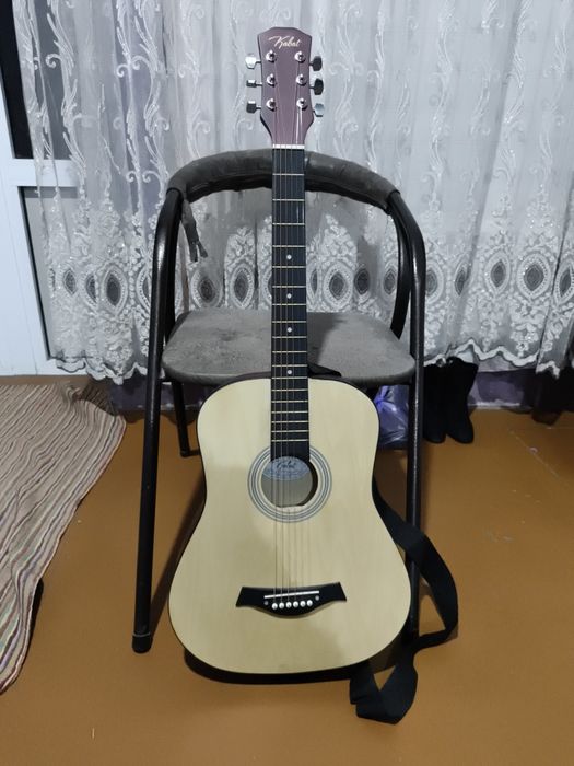 Gitara yangi kup ishlatilmagan