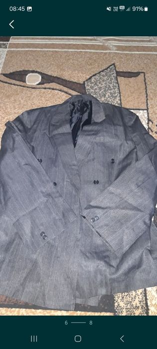 Продам новые мужские костюмы