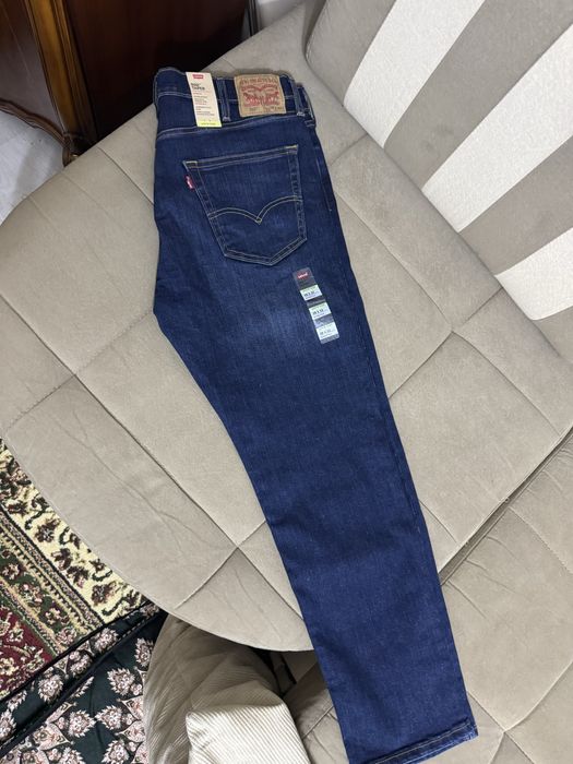 Мужская оригинал джинсы Levis (38/32) 502 TAPER STRETCH