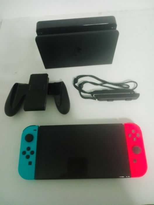 Nintendo Switch OLED — Nou / Neutilizat
