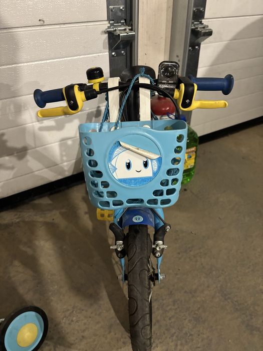 Vând bicicletă copii B'TWIN Ocean 100 (Decathlon), mărime 14 inch, potrivită pentru copii cu vârsta între 3 și 5 ani (înălțime aprox. 90 – 105 cm).