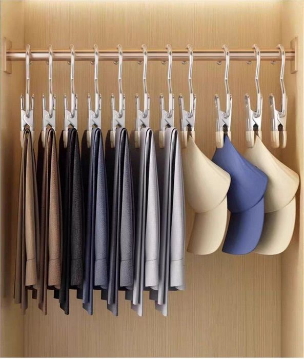 Универсальная и многофункциональная вешалка с зажимом. 

Н