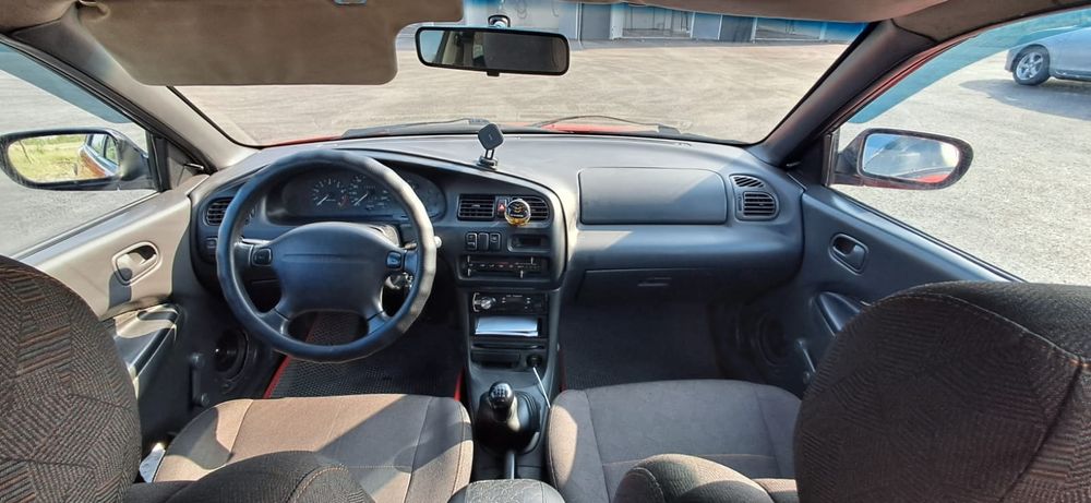 Мазда 323 год 1995