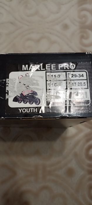 Роликовые коньки