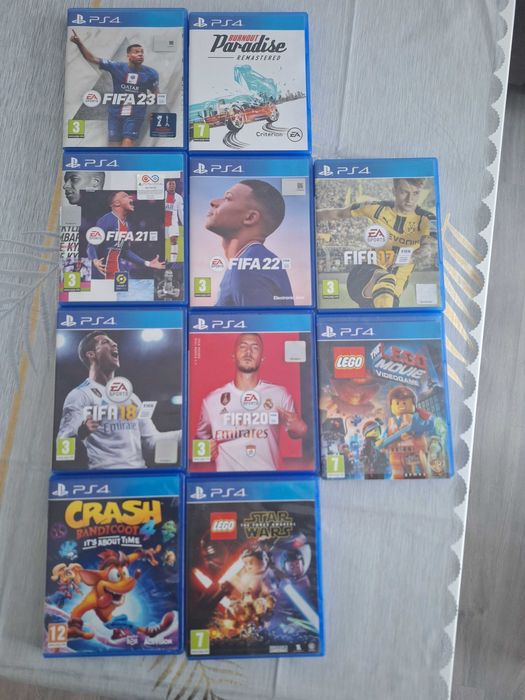 PS 4 slim , 500 GB , 13 jocuri , 2 controlere  , volan cu pedale ps4