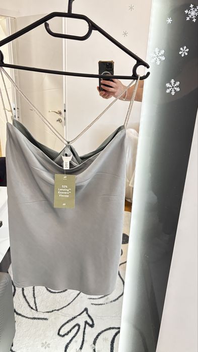 Светло син потник с блестящи презрамки