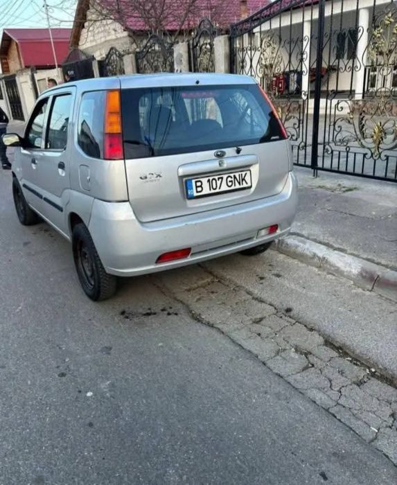 Vand Subaru just 
93 cp 4×4 
Geamuri electrice faț