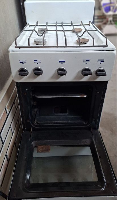 Газ плита четырёх комфорочная