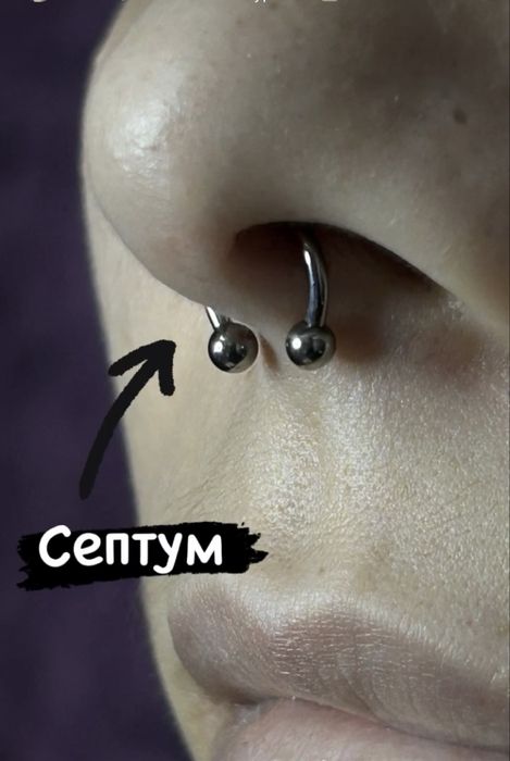 Мастер пирсинга